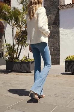 Light Wash Button Front Kick Flare Jeans -Trendora Shop a0fdefebe568b4fbbc35286259aeef6c009eb9df