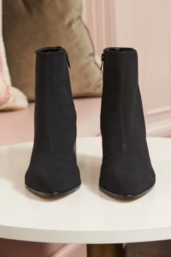 Black Metallic Heel Sock Boot 13 Black Metallic Heel Sock Boot -Trendora Shop web still life 018