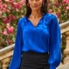 Blue Plisse Sleeve Tie Neck Blouse